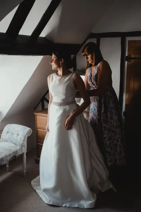 Bride preparing beside a window at No. 40